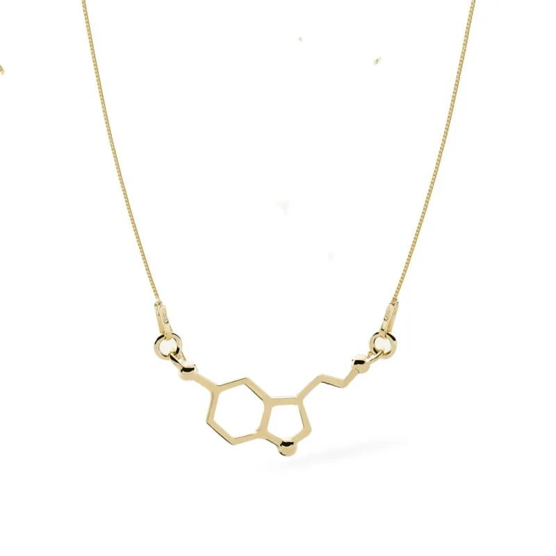 Förgyllt halsband med serotoninmolekyl