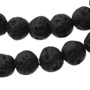 Närbild av två trådar med runda, enfärgade Karneol rund ädelsten-pärlor (4-6 mm) mot en vit bakgrund.