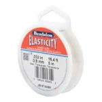 En rulle Beadalon Elasticity klar elastisk sladd, 0,8 mm tjock och 5 meter lång, med en etikett som visar produktinformation på engelska, franska och spanska.