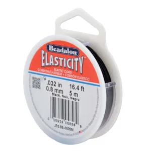 En rulle Beadalon Elasticity elastisk sladd, 0,8 mm (0,032 tum) tjock och 5 meter (16,4 fot) lång, i svart, med produktinformation tryckt på etiketten.