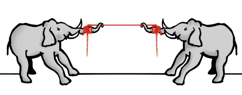 Två elefanter står vända mot varandra och drar i en röd Griffin High Performance Vit Smycketråd med sina snablar. Blod droppar från deras snablar, vilket tyder på skador från kampen mot den starka smyckestråden. Bakgrunden är helt vit.