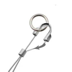 Närbild på Knutgömma sterlingsilver 3mm: en kabelögla av metall med ring och pressad hylsa, med en pil som pekar på var kabeländen passerar genom hylsan för säker fastsättning.