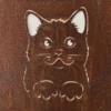 Close-up of a heavily rusted metal surface with a white outline drawing of a cartoon butterfly-like shape in the center.