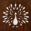 Rusted metal sheet with a white floral cutout pattern radiating from center, creating a flower motif.
