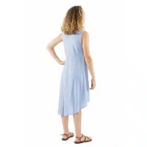 Back view of a woman wearing a light blue sleeveless midi dress, with curly hair and brown sandals.