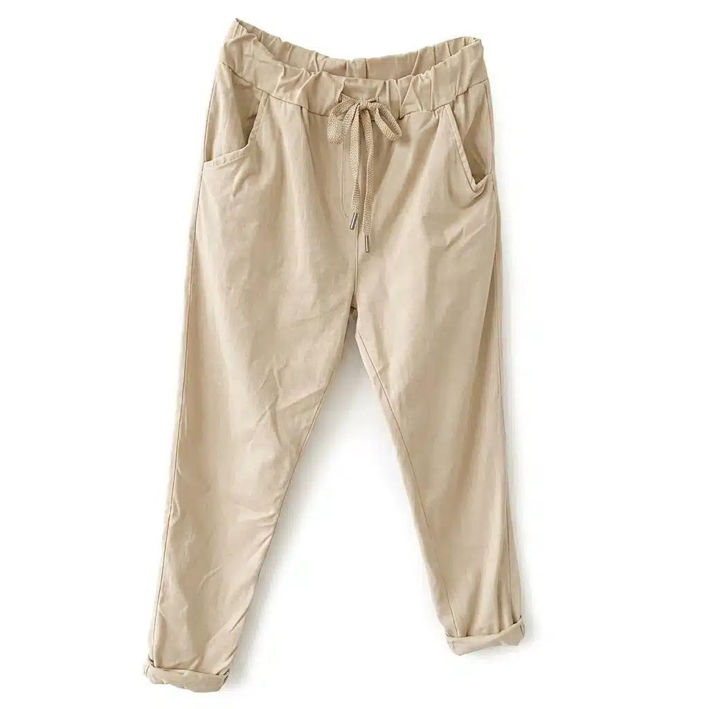 Beige casual jogger pants with a drawstring waist and rolled cuffs at the ankles, front pockets visible.