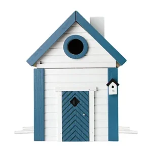 IMG_2085 - Fredrix Design & Smyckerian White wooden birdhouse in the shape of a house with blue trim, a round blue-edged entrance hole, and a blue chevron door.