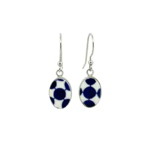 Oval silver earrings with blue and white geometric pattern on porcelain caboches, hook backings